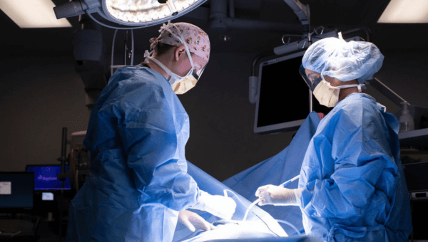 Two surgeons working in an operating room