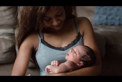 African American mother with her newborn baby
