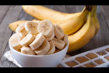 Bananas and banana slices on a plate