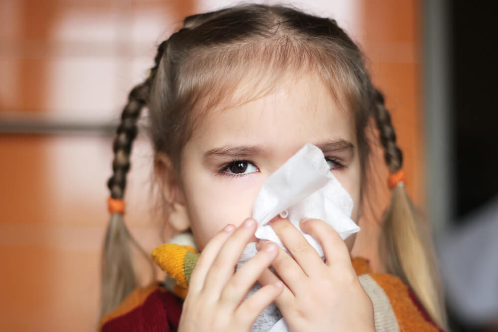 Child with a nosebleed