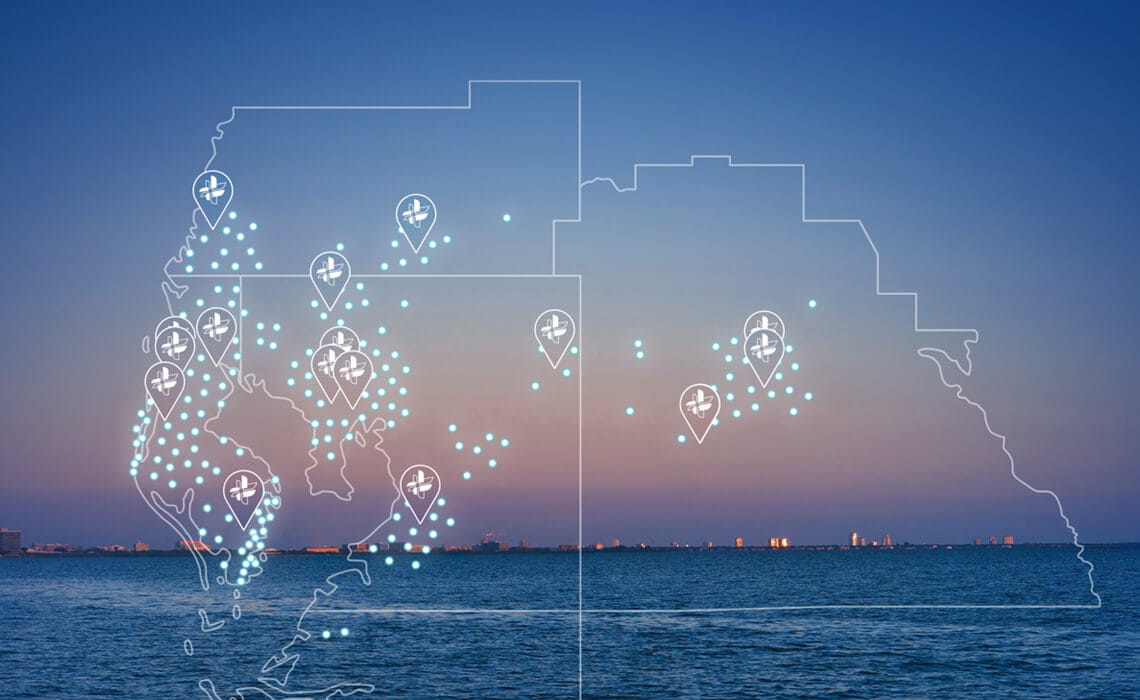 Photo of the Florida skyline with an overlay of the counties we are located with pins indicating our locations