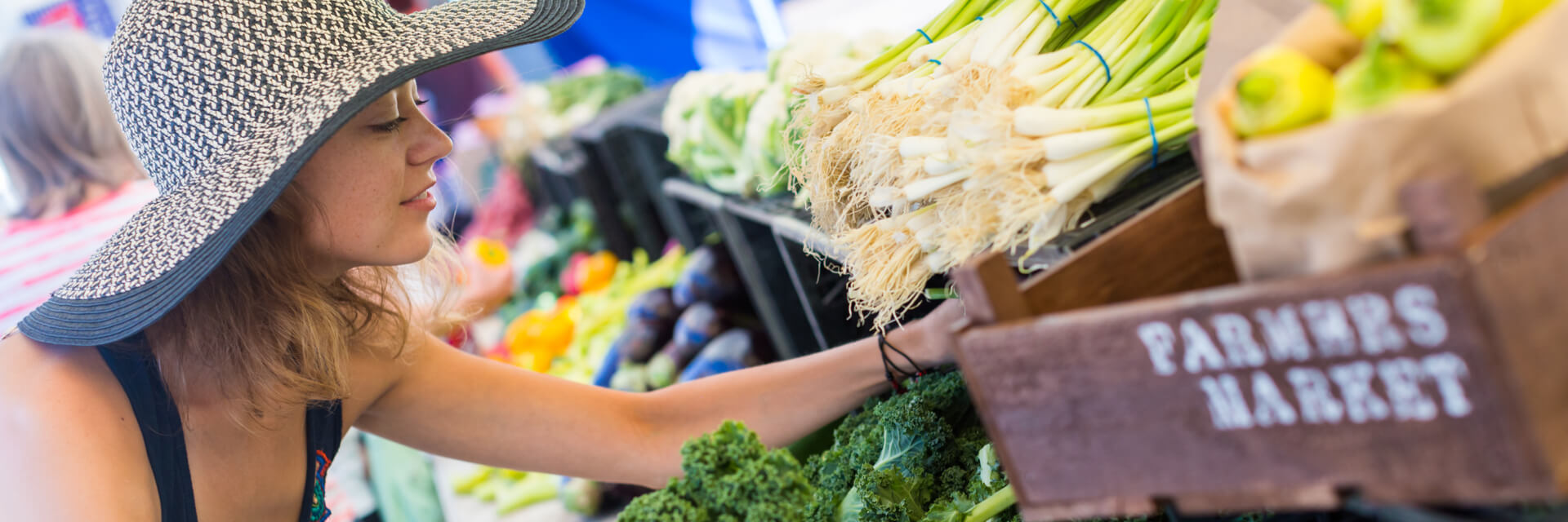 female shopper at farmers market