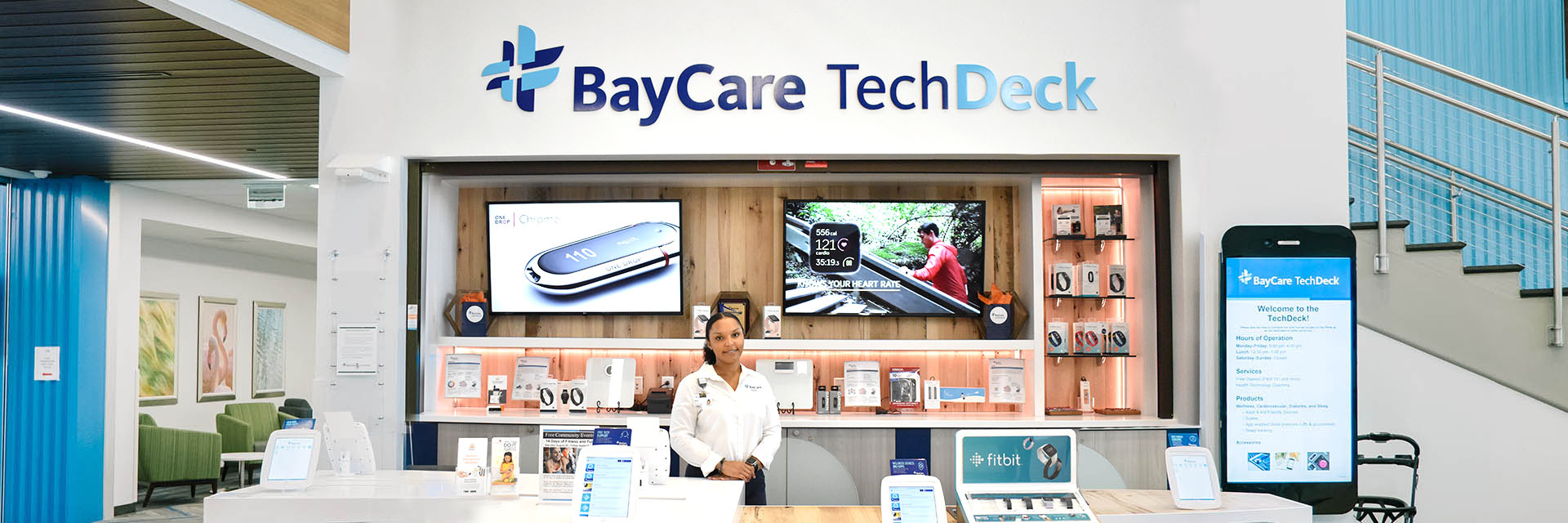 BayCare TechDeck A BayCare employee standing in front of a BayCare TechDeck station.