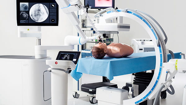 An Ion Bronchoscopy machine with a mannequin on the table.