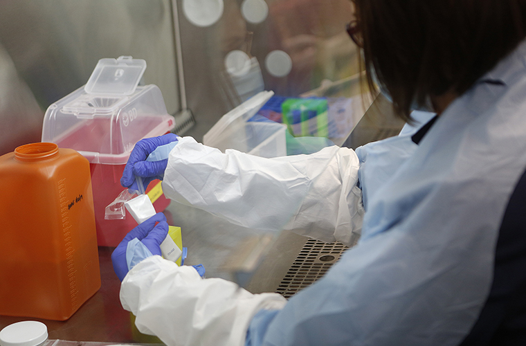 A BayCare laboratory team member conducts a test.