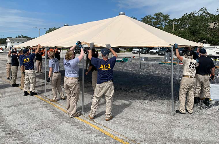 Officials set up a large tent to create a temporary medical resource for the Tampa Bay community.