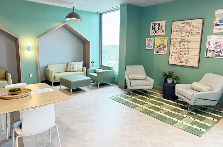 A cozy room decorated in green hues.