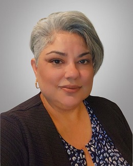 A headshot photo of Mabel Melo.