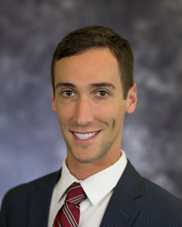 A headshot photo of Shayne Gue, MD, MSMEd, FACEP.