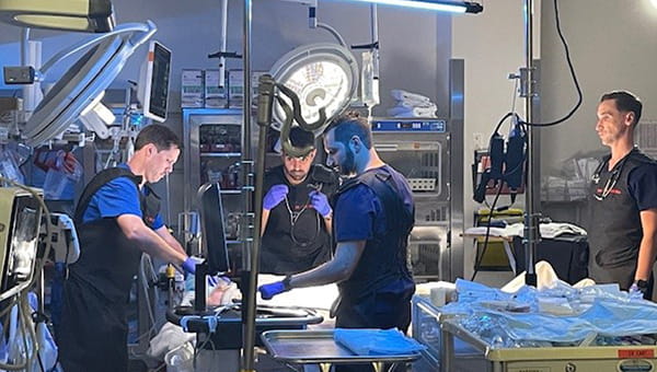 BayCare physicians work on a patient in the emergency room trauma bay at St. Joseph's Hospital.