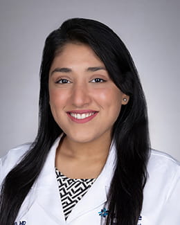 Headshot of Maham Shaikh, MD in a lab coat 