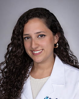 Headshot of Stephanie Izquierdo, MD, MPH in a lab coat
