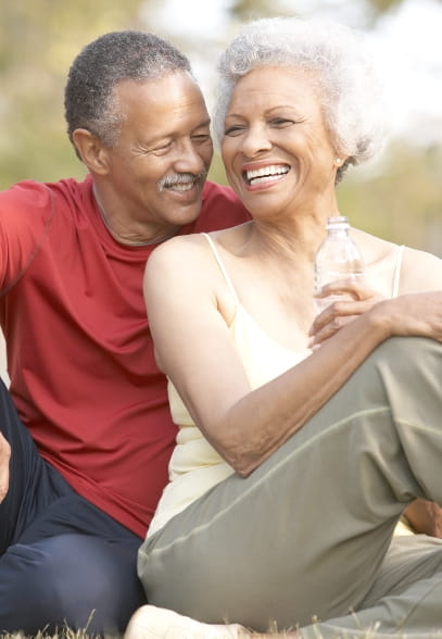 Mature couple sitting outside