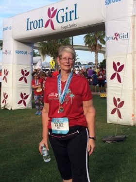 Nancy O. at a 5K road race after her bariatric surgery