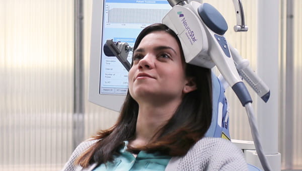 Lauren is a patient receiving TMS treatment.