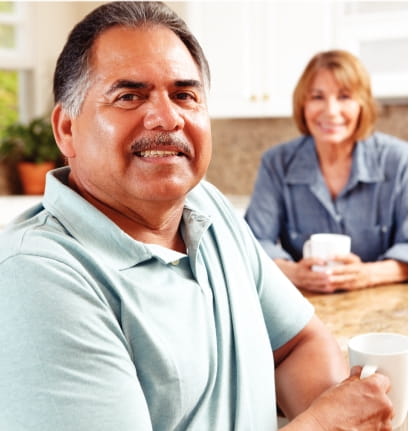 Man and wife sitting in the kitchen