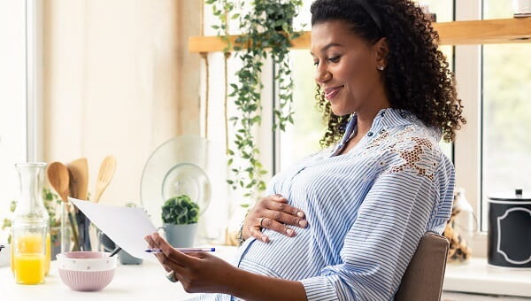 A pregnant woman is visiting her doctor for a checkup.