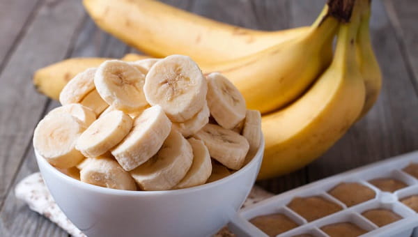 Bananas and banana slices on a plate