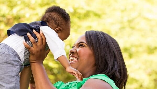 mother and son outside in nature